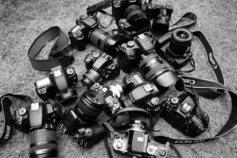 A slew of DSLR cameras on the ground