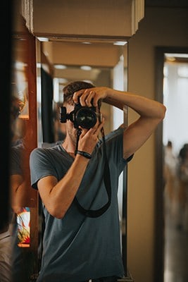 Man with DSLR camera