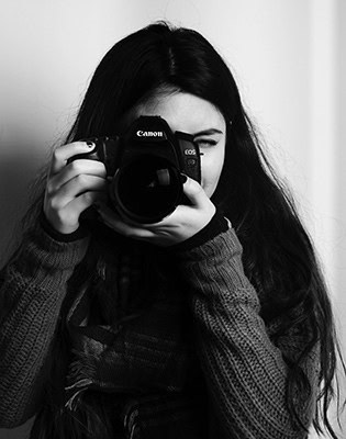 Female photographer in black & white