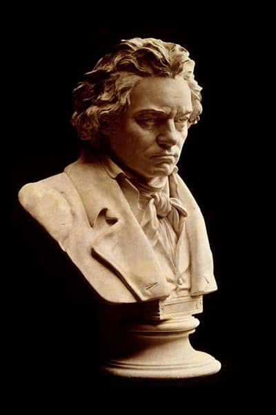 White bust of Beethoven against dark background