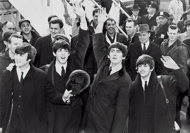 The Beatles black and white image off plane