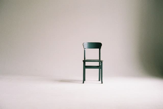 green-wooden-chair-in-white-seamless-cove